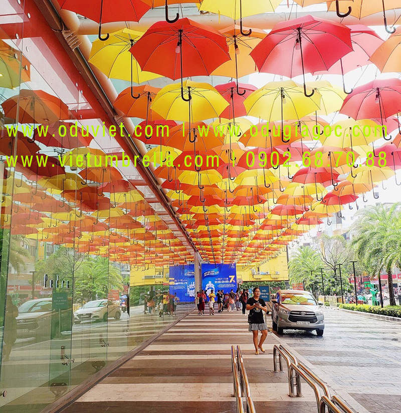 xưởng sản xuất ô dù cầm tay in logo quảng cáo